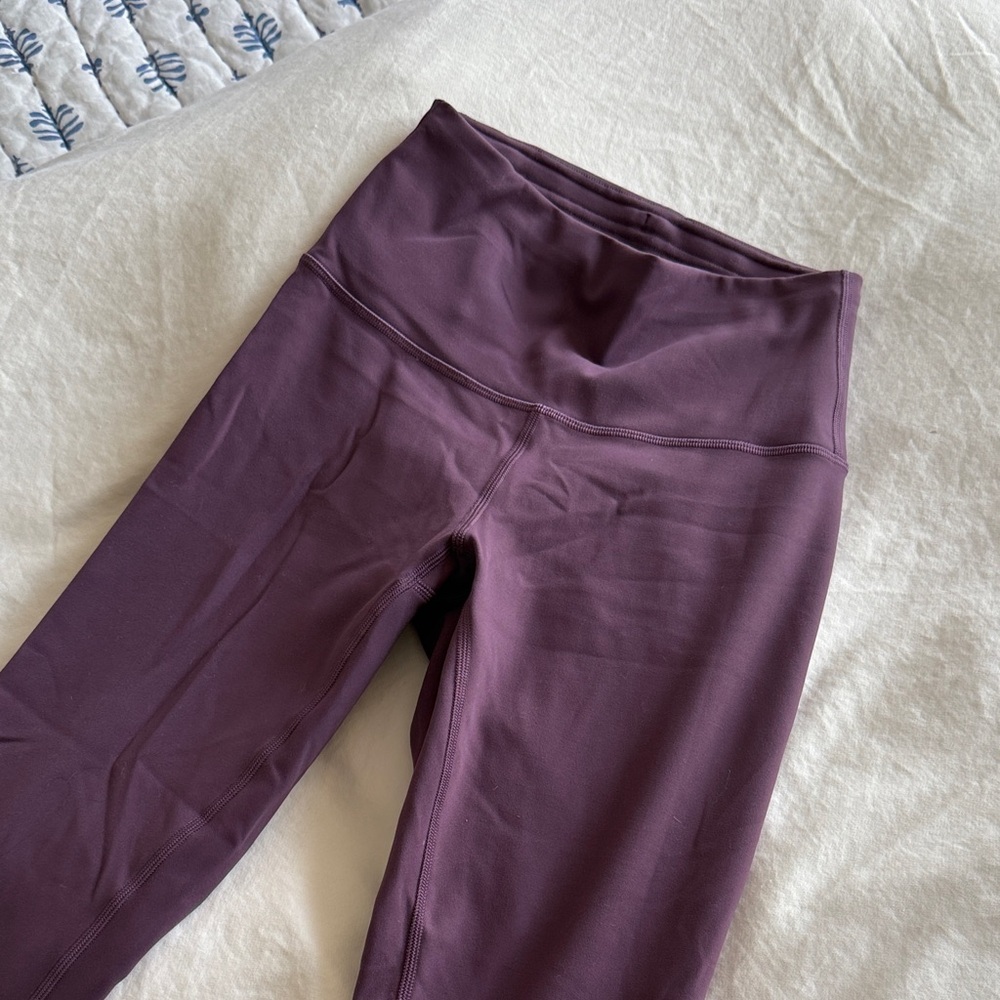 Lululemon wunder train size 4, 25 inch length, dark purple